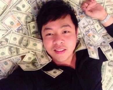 Ca sĩ Quang Lê bỏ 10.000 USD làm từ thiện sau màn khoe tiền