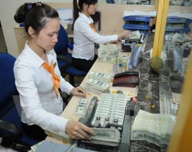 Tăng tỷ giá giữa đồng Việt Nam và USD kể từ ngày 7/1/2015