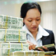 NHNN bất ngờ nâng tỷ giá thêm 1%, nới biên độ tỷ giá lên +/-3%