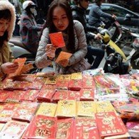 Thống kê chi phí ăn Tết của người Việt trên báo Tây