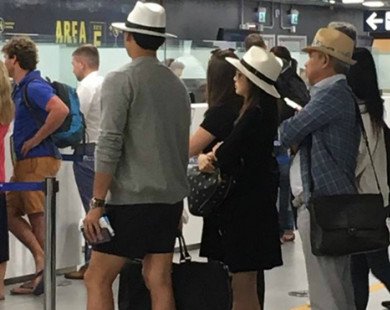Kim Tae Hee lấy túi che bụng bầu khi bị 'chộp' ở sân bay Italy