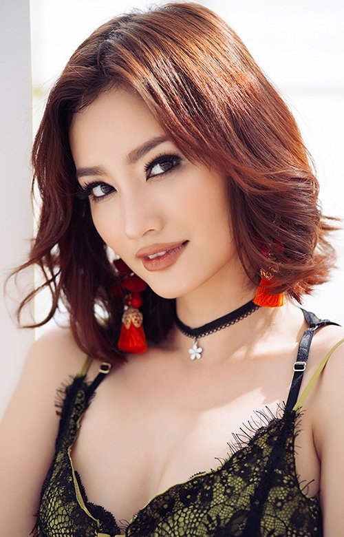 Hoa hậu Trúc Diễm khoe thời trang gợi cảm rực rỡ đón hè