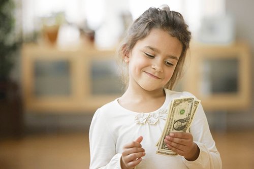 Dạy trẻ cách hành xử khôn ngoan với tiền bạc