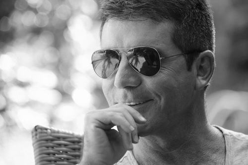 "Cáo già" Simon Cowell U60 vẫn khiến đàn bà điêu đứng